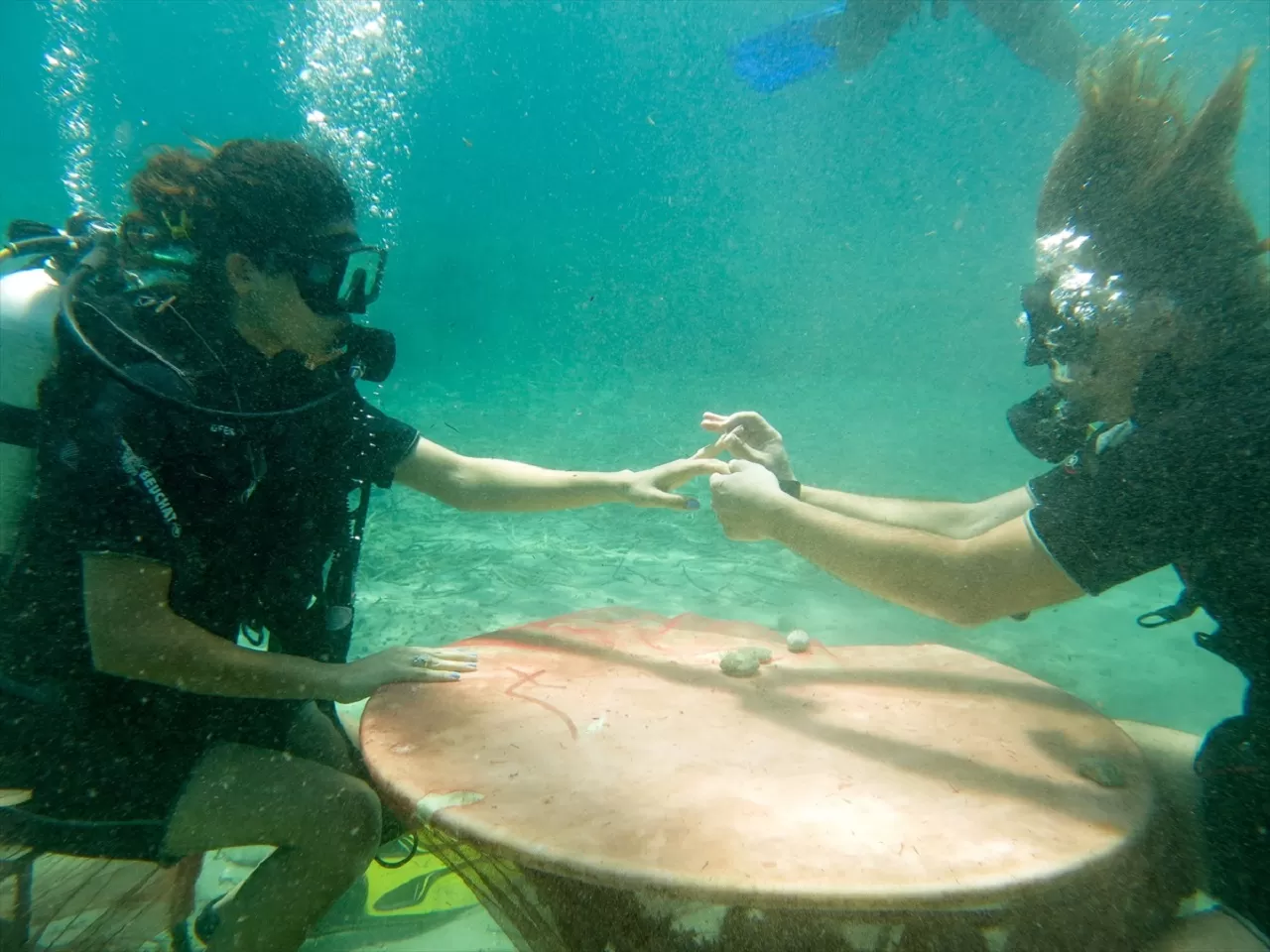 su altı evlilik teklifi